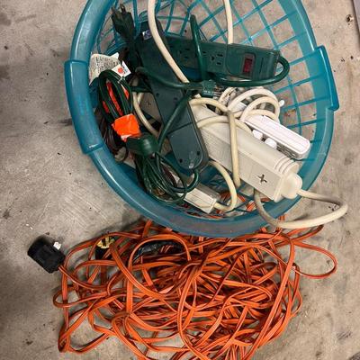Basket of Surge Protectors and Extension Cord