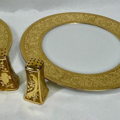 Gold border plates and gold porcelain salt