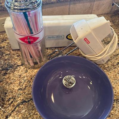 Wearing handmixer, straw holder bowl and Hamilton Beach electric carving knife