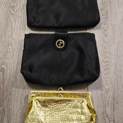 (2) Georgio Armani and (1) Gold Makeup Bags