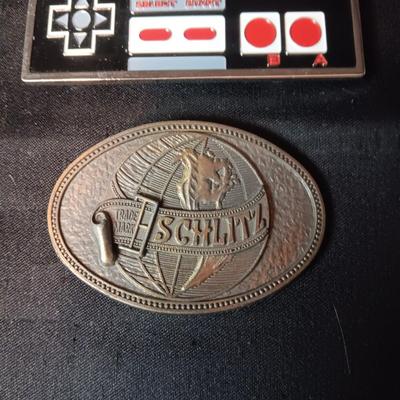 SCHLITZ AND NINTENDO BELT BUCKLES