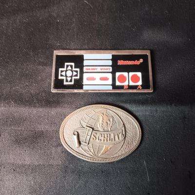 SCHLITZ AND NINTENDO BELT BUCKLES