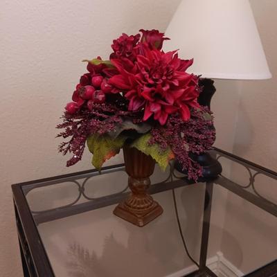 2 TIER IRON FRAME SIDE TABLE WITH GLASS TOP, SMALL LAMP AND SILK FLOWERS