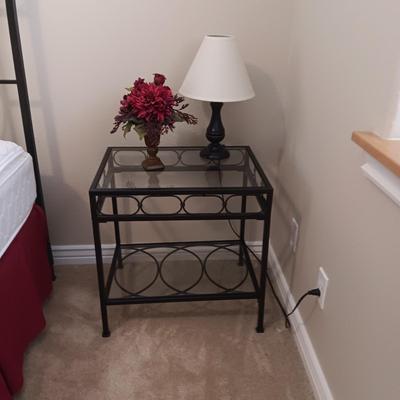 2 TIER IRON FRAME SIDE TABLE WITH GLASS TOP, SMALL LAMP AND SILK FLOWERS