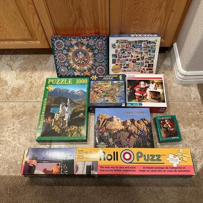 JIGSAW PUZZLES AND A ROLL PUZZ