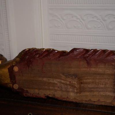 BURMESE RECLINING NAT OF CARVED WOOD AND GILDED FINISH