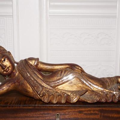 BURMESE RECLINING NAT OF CARVED WOOD AND GILDED FINISH