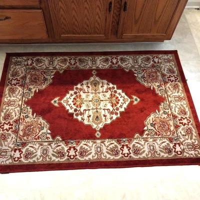 TWO MATCHING BATH RUGS
