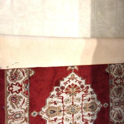 TWO MATCHING BATH RUGS