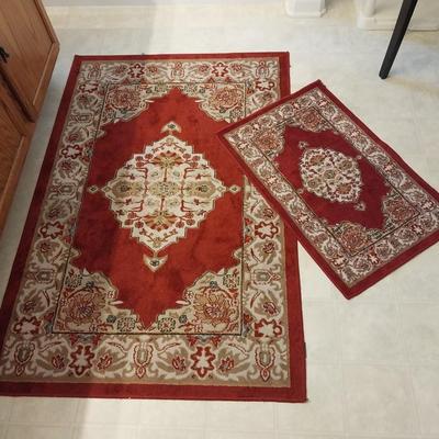 TWO MATCHING BATH RUGS