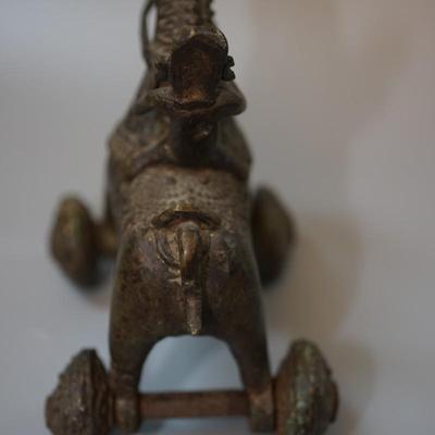 BURMESE /INDIA SOLID BRONZE ANTIQUE FIGURE ON HORSE. WITH WHEELS.