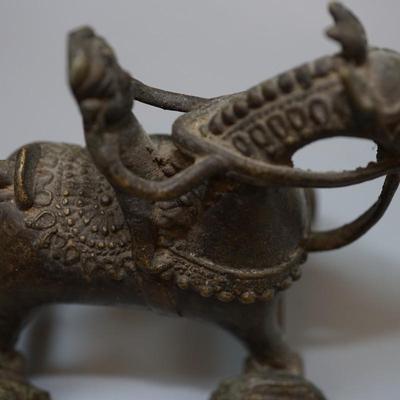 BURMESE /INDIA SOLID BRONZE ANTIQUE FIGURE ON HORSE. WITH WHEELS.