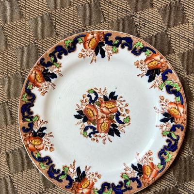 Black and orange china with gold trim