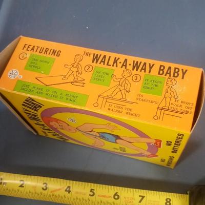 LOT 119 VINTAGE WALK-A-WAY BABY TOY