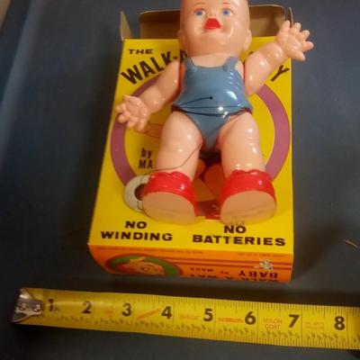 LOT 119 VINTAGE WALK-A-WAY BABY TOY