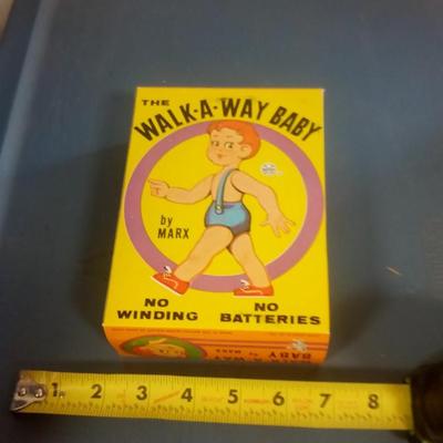 LOT 119 VINTAGE WALK-A-WAY BABY TOY