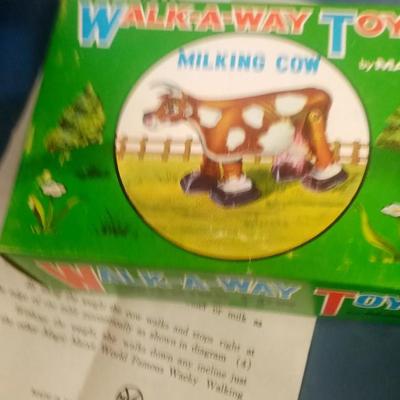 LOT 120 TOY MILKING COW BY MARX