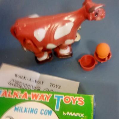 LOT 120 TOY MILKING COW BY MARX