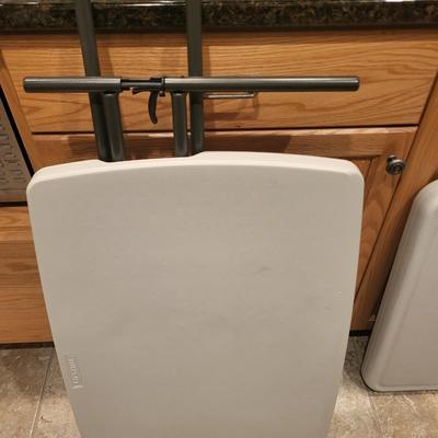 2 SMALLER FOLDING TABLES