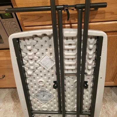 2 SMALLER FOLDING TABLES