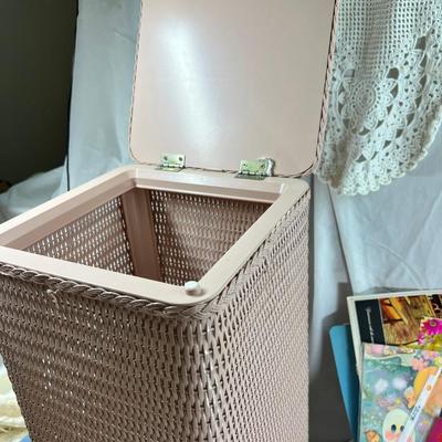 Mid century pink woven hamper and vintage linens