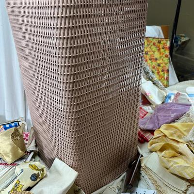 Mid century pink woven hamper and vintage linens