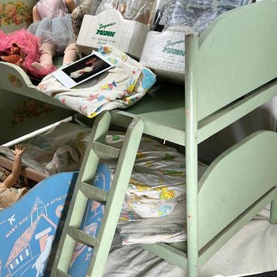 Dolls and doll cradle and bunkbed with ladder