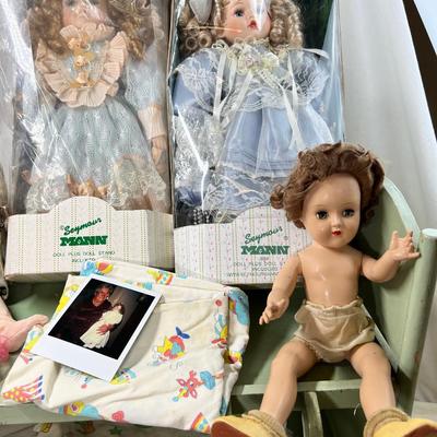 Dolls and doll cradle and bunkbed with ladder
