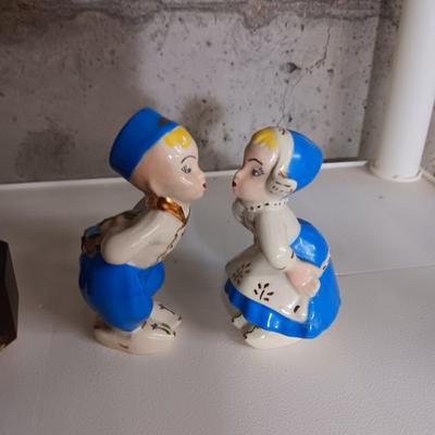 A STAUBACH KISSING DUTCH FIGURINES AND SCHMID ROTATING MUSIC BOX