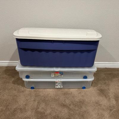 2 UNDER THE BED STORAGE W/WHEELS AND A LARGE STORAGE TOTE