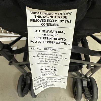 FOLDING STROLLER AND SAFETY GATE
