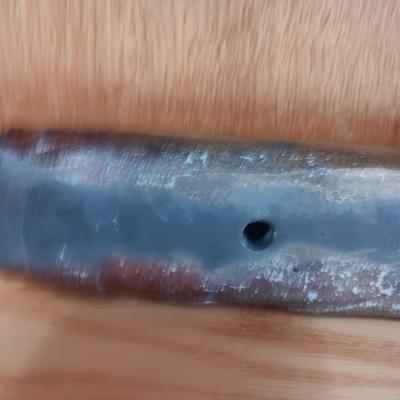SIGNED CLAY WALL POCKET WITH AN IRIDESCENT GLAZE AND 2 METAL CANDLE ILLUMINATORS