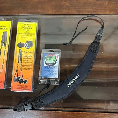 ADJUSTABLE CAMERA STRAP, UTILITY STRAP AND LENS SUPPORT