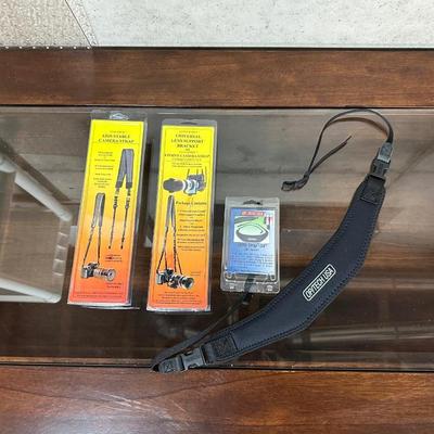 ADJUSTABLE CAMERA STRAP, UTILITY STRAP AND LENS SUPPORT