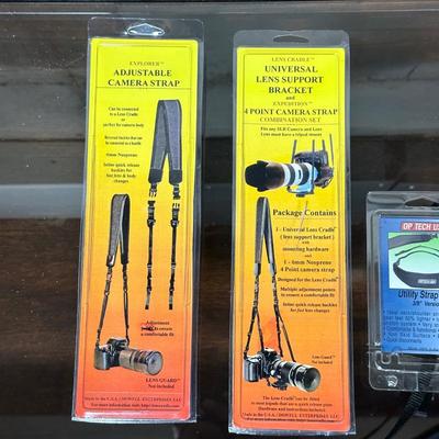 ADJUSTABLE CAMERA STRAP, UTILITY STRAP AND LENS SUPPORT