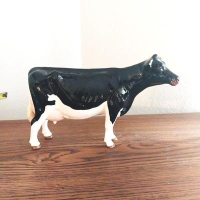 TWO COLLECTABLE MILKING COWS AND FRAMED FIELD