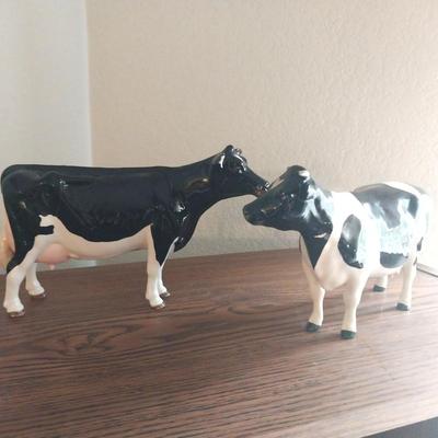 TWO COLLECTABLE MILKING COWS AND FRAMED FIELD