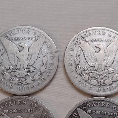 Set of Four U. S. Mint Morgan Silver Dollars (#168) Various Worn Condition Legible Dates