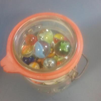 LOT 128 OLD JAR OF MARBLES