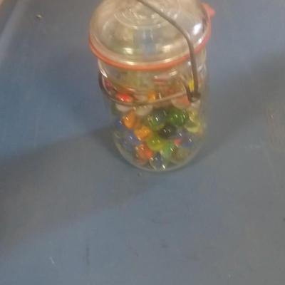 LOT 128 OLD JAR OF MARBLES