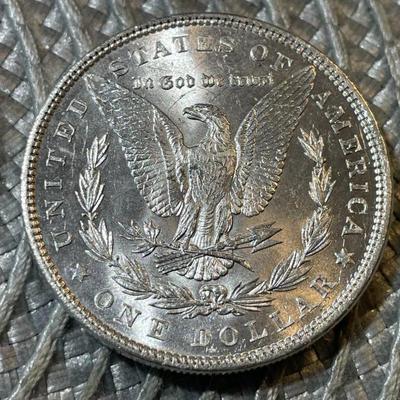 1886-P UNCIRCULATED CONDITION MORGAN SILVER DOLLAR (COIN #2) AS PICTURED.