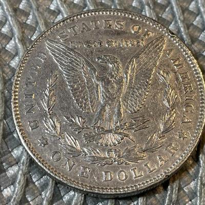 1878-P 7-TF EXTRA FINE CONDITION/POLISHED MORGAN SILVER DOLLAR (COIN #5) AS PICTURED.