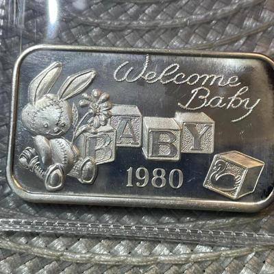 VINTAGE 1980 WELCOME BABY .999 FINE SILVER 1-OUNCE ART BAR IN VG CONDITION (BAR #11).