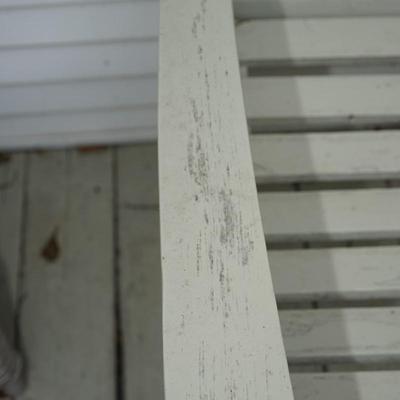 WOODEN GARDEN BENCH PAINTED A SOFT GREEN/ GREY TONE.