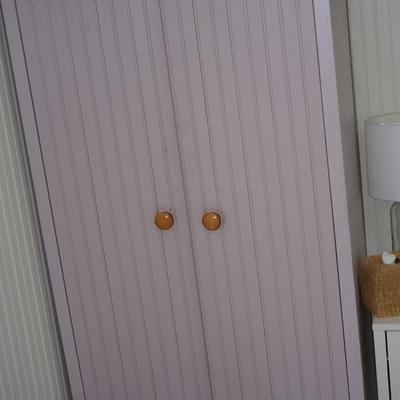 WOOD PAINTED A LAVENDER COLOR WITH NATURAL KNOBS WAINSCOT WARDROBE CABINET W/ DRAWER