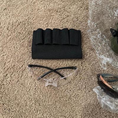 MAGAZINE HOLDER, CABELAS SAFETY EAR MUFFS, SAFETY GLASSES AND LEATHER BAG WITH BELT