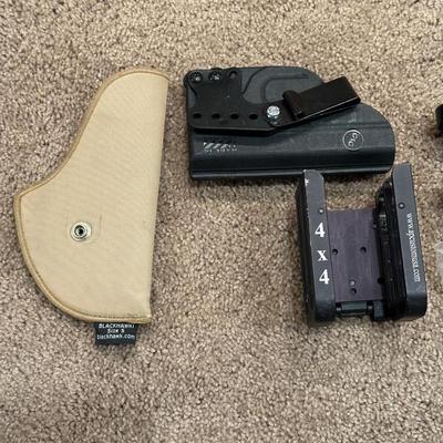 2 PISTOL HOLSTERS, SAFETY GLASSES AND SHELL SPEED STRIPPERS