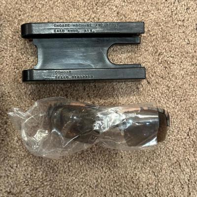 2 PISTOL HOLSTERS, SAFETY GLASSES AND SHELL SPEED STRIPPERS