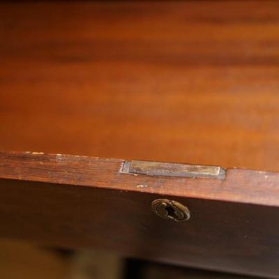 CIRCA 1860 BUTLERS STYLE CHEST IN FLAME MAHOGANY / SANDWICH GLASS CO. KNOBS.