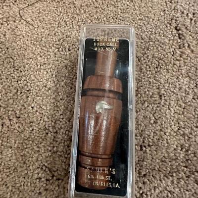 FAULK'S SUPREME DUCK CALL AND "BUTT OUT" FIELD DRESSING TOOL